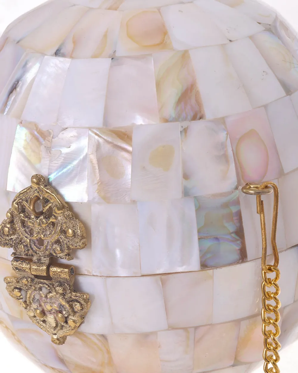 clutch_esfera_1.webp Juan Bernal Clutch^Clutch Esfera